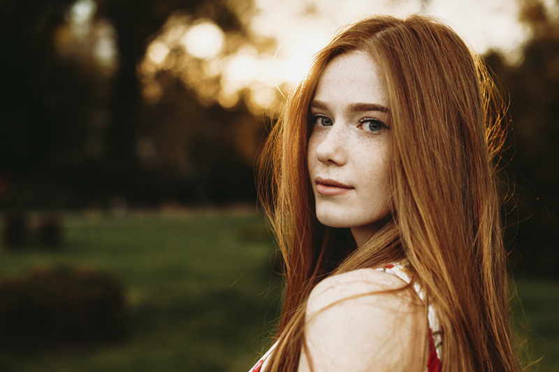 woman looking at the camera with a serious look on her face